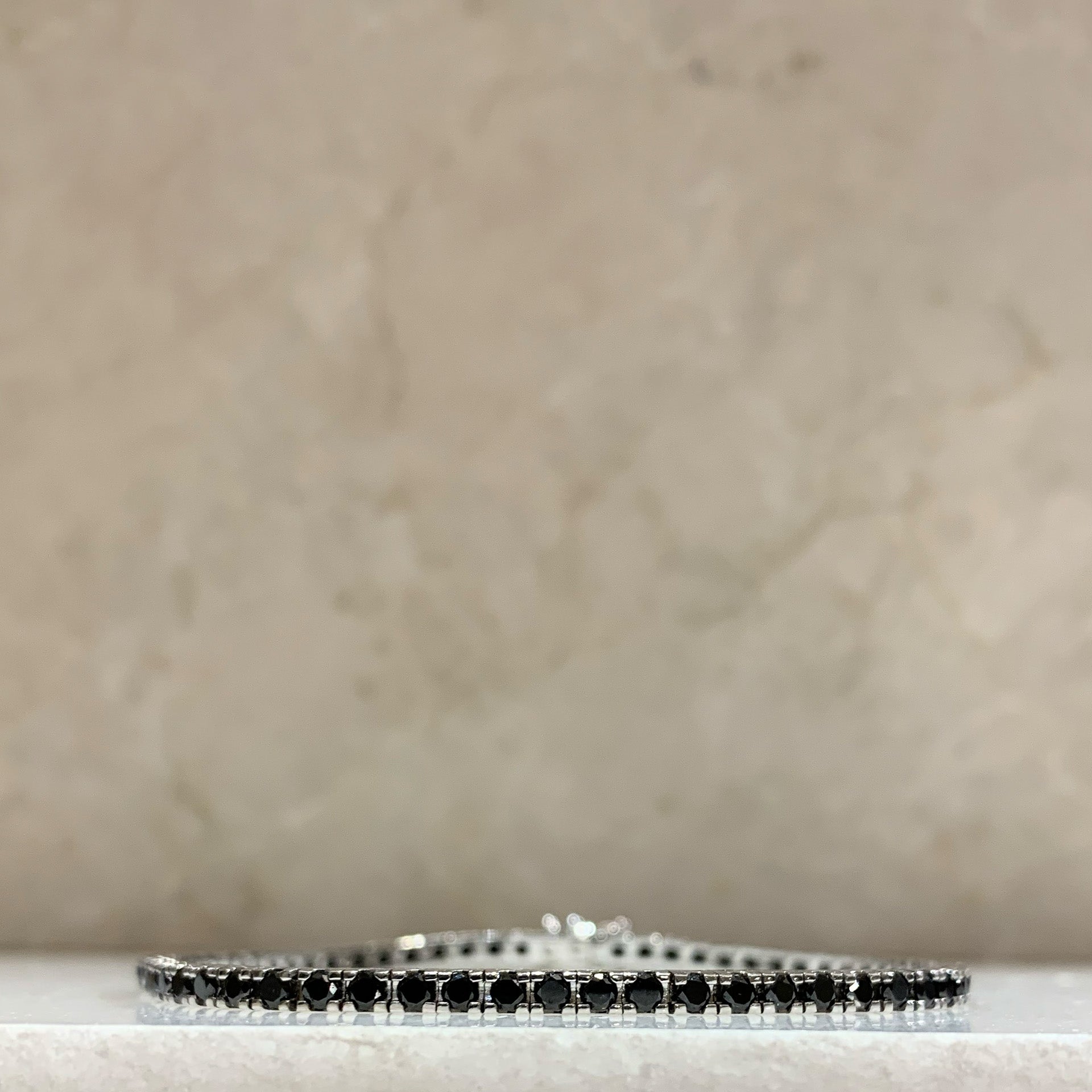 Tennis in Oro Bianco con diamanti neri