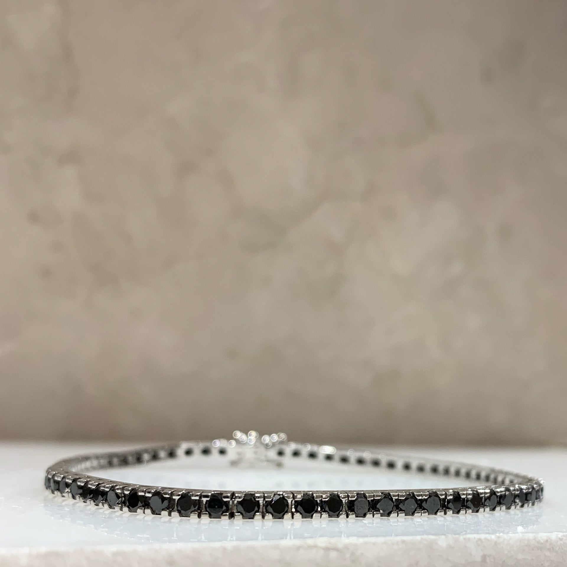 Tennis in Oro Bianco con diamanti neri