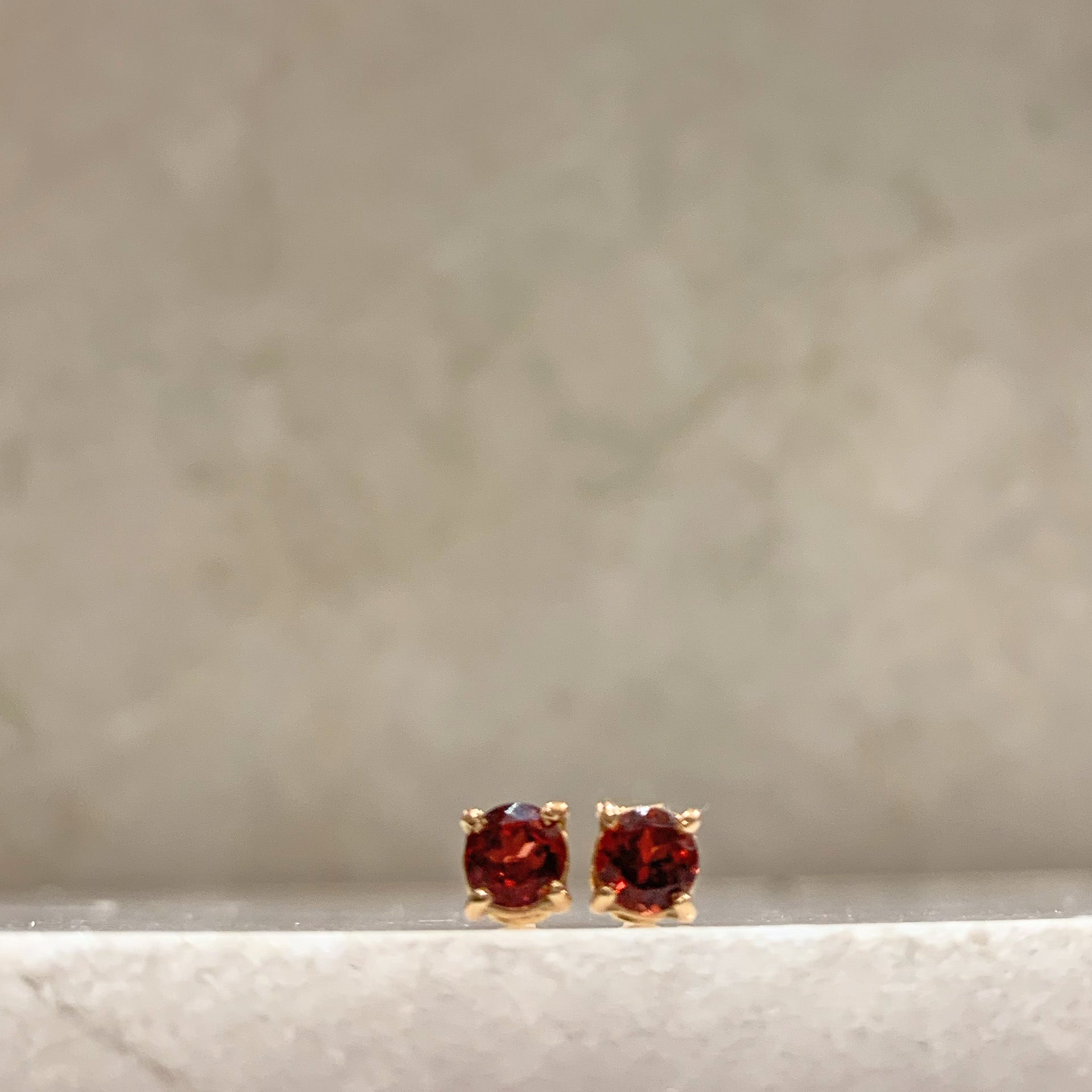 Punti luce in Oro Rosa e granato