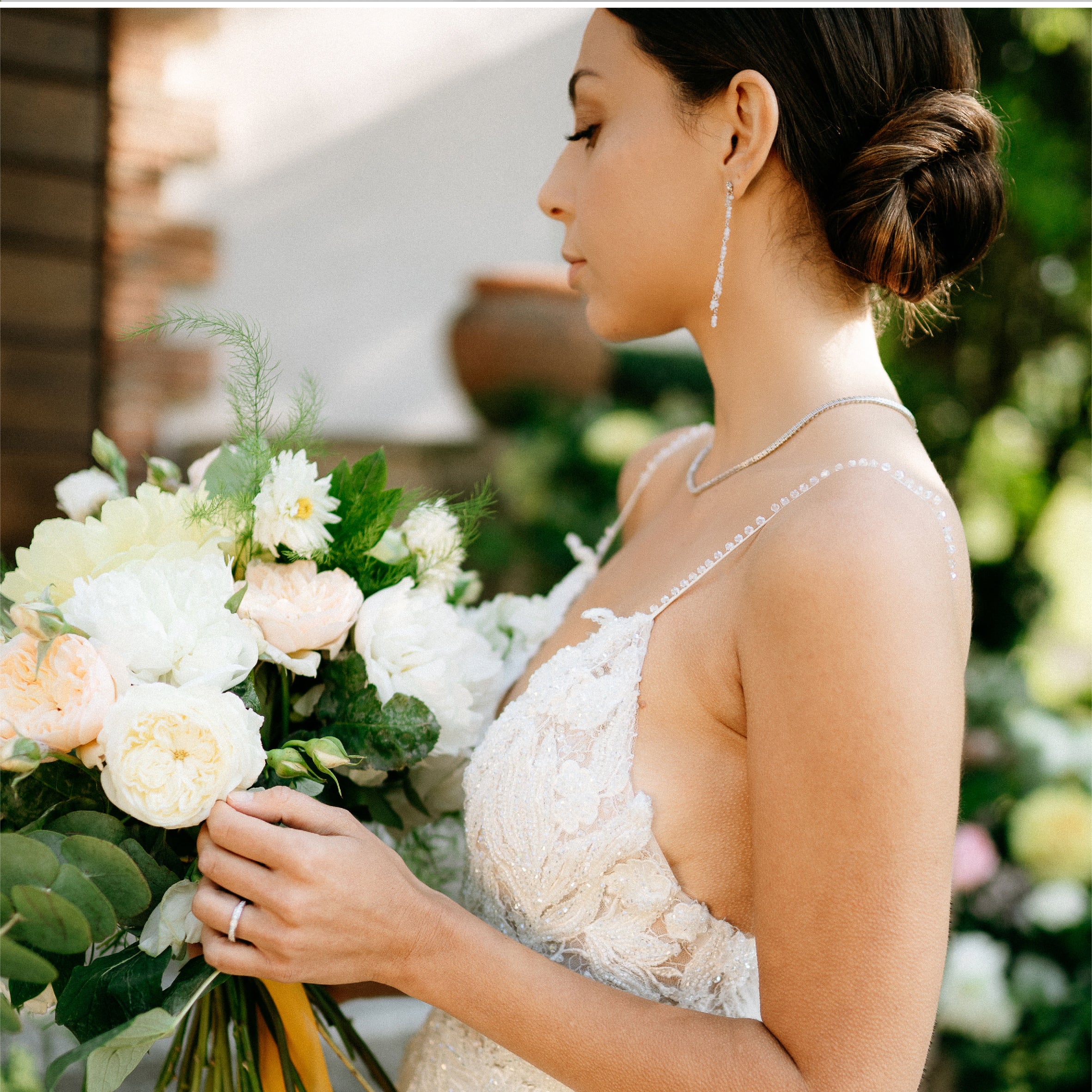 Orecchini pendenti in Oro Bianco 750% e diamanti