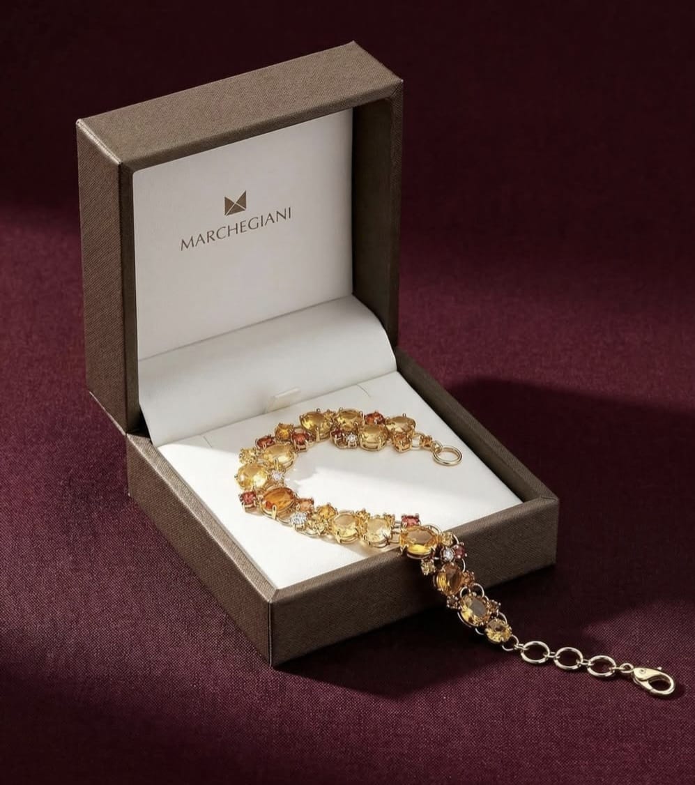 Bracciale in Oro Giallo con Zaffiri Gialli e Arancioni e Diamanti.