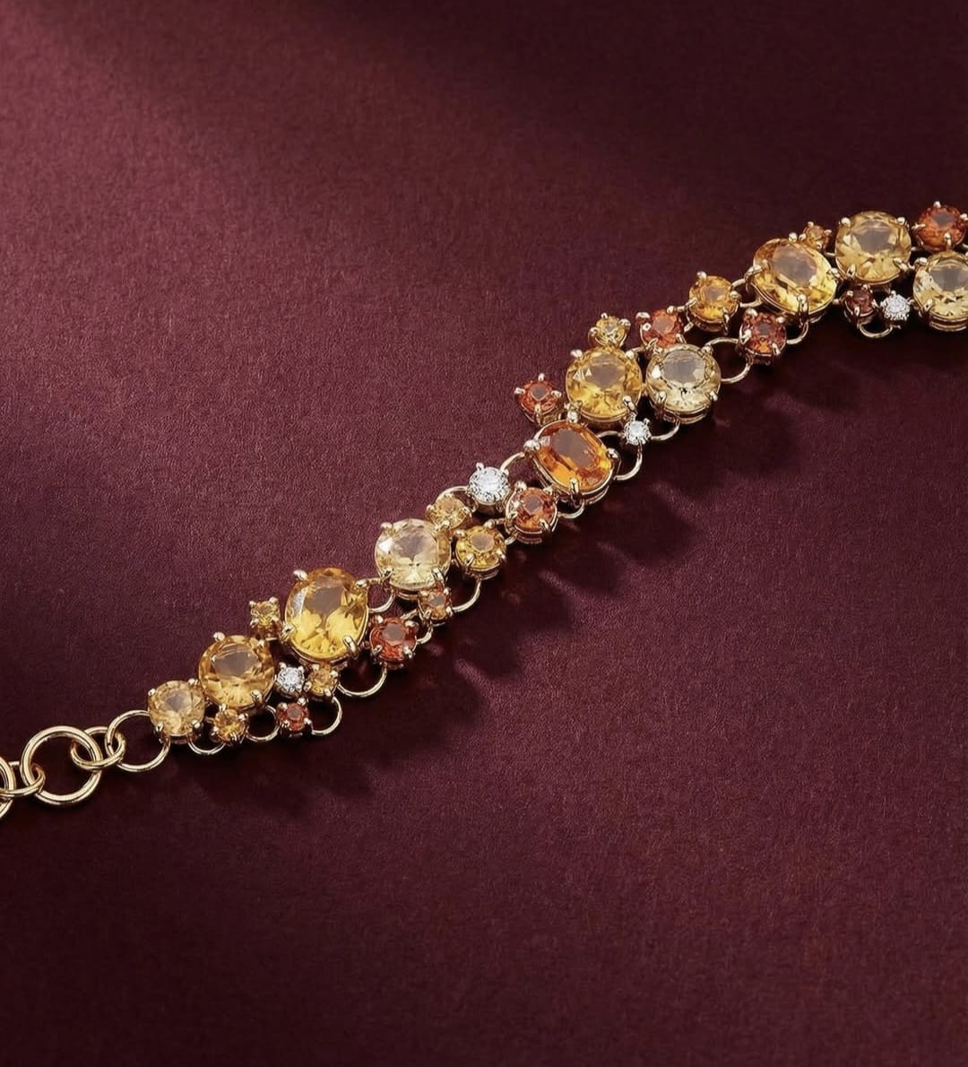 Bracciale in Oro Giallo con Zaffiri Gialli e Arancioni e Diamanti.