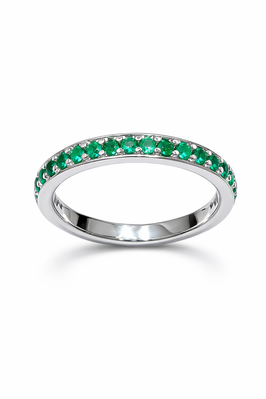 Anello veretta in oro bianco e smeraldi